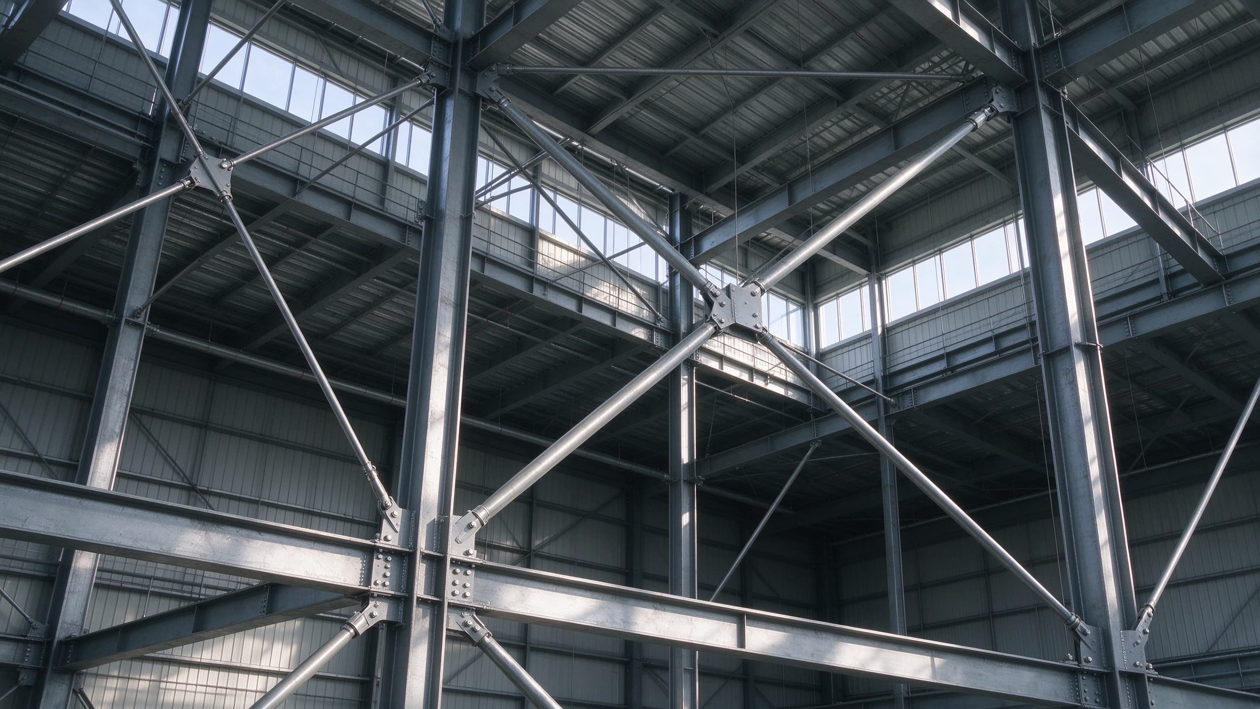 Industrial steel platform with grating and handrails inside a plant