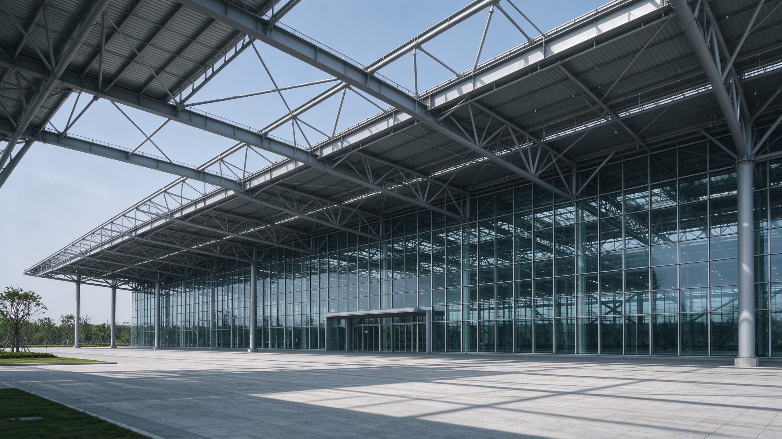Steel structure railway station concourse with long span roof over platforms
