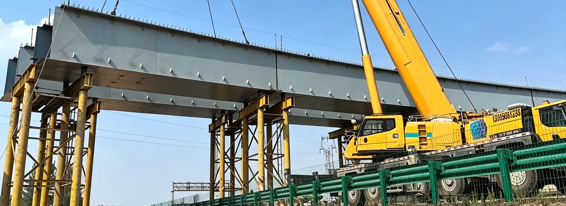 steel bridge structure showing workshop operations and production workflow.